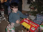 Joseph opening gifts