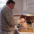 Grandpa preparing chicken